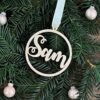 houten kerstbal met naam door taste of wood