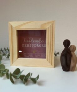 kerstgeschenk in de vorm van een spaarpot door taste of wood